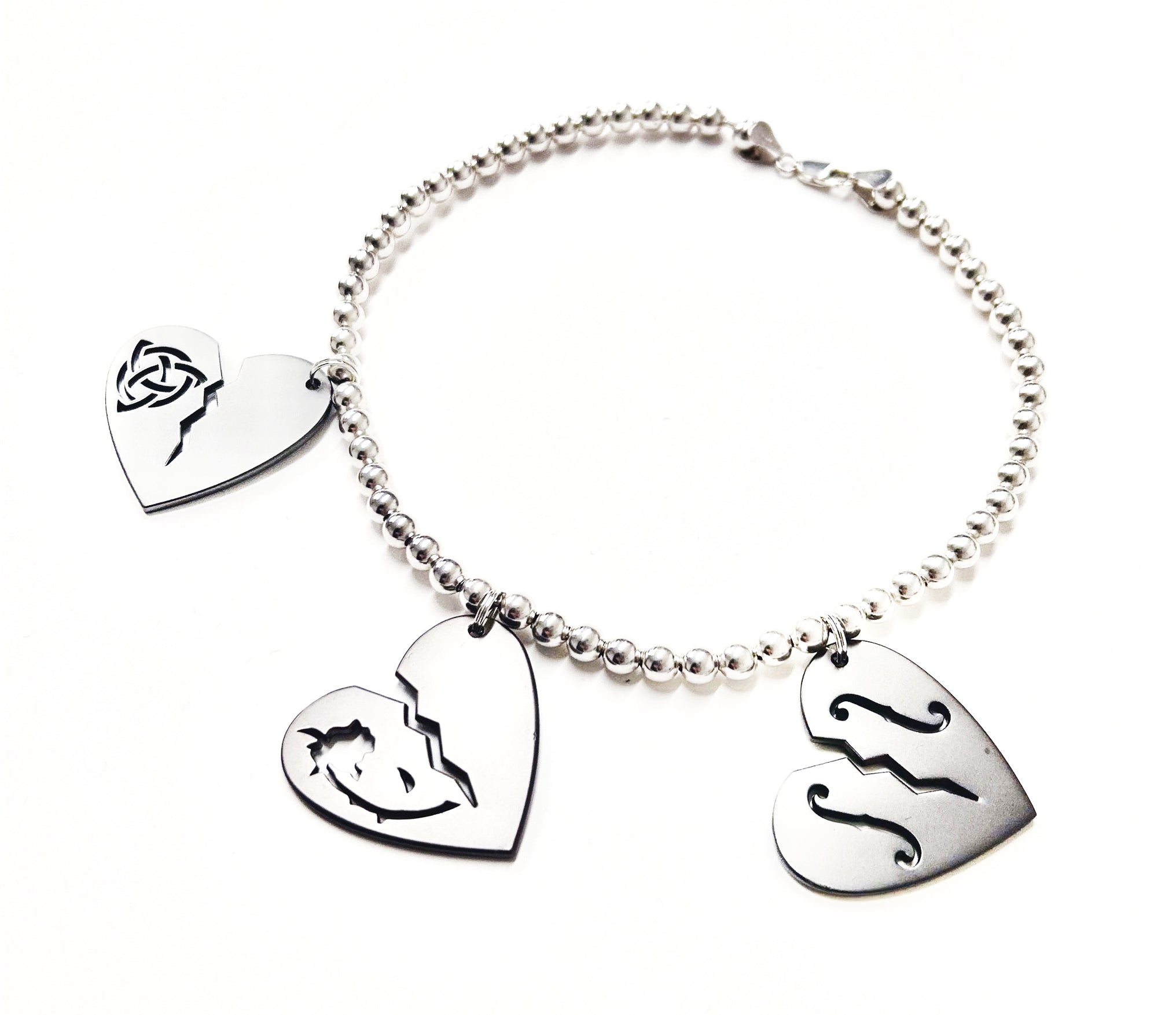 Triple Heart Necklace Silver Sin ad O Dwyer triple-heart-necklace-silver-sin-ad-o-dwyer